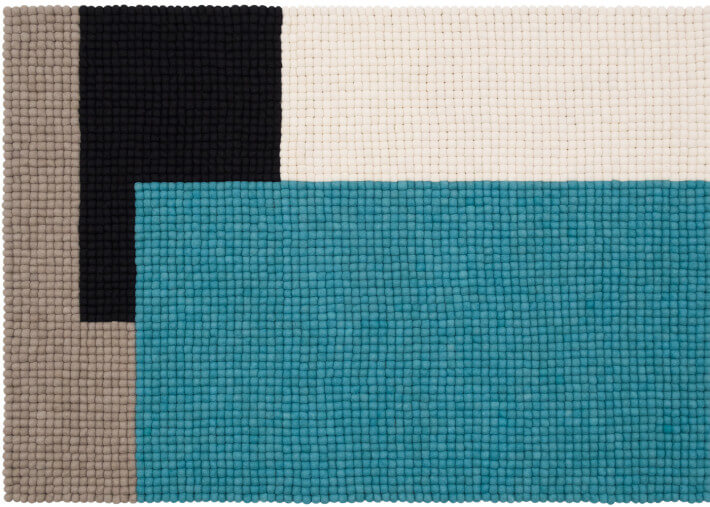 Tapis en billes de laine bleu turquoise noir...