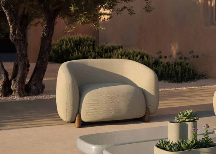 Fauteuil cosy et confortable en iroko et tissu...