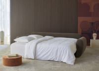Canapé-lit au confort enveloppant Norum Curve Arms - Innovation Living