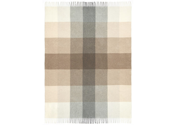 Plaid Kensington en laine mérinos dans un intérieur contemporain
