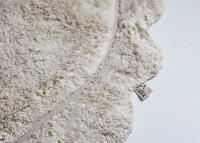 Tapis enfant ovale blanc naturel – Marisa Nattiot