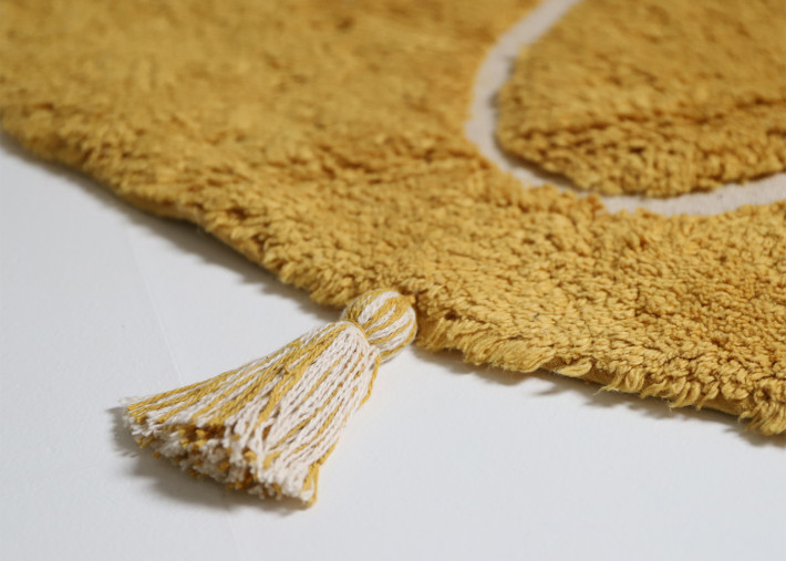 Tapis enfant rond jaune mangue à pompons – Yva...