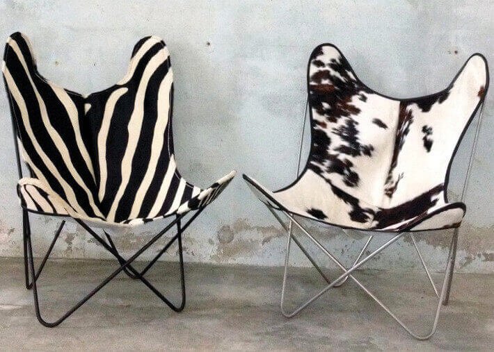 Fauteuil design en veau de vache véritable Fauteuil design en veau de vache véritable