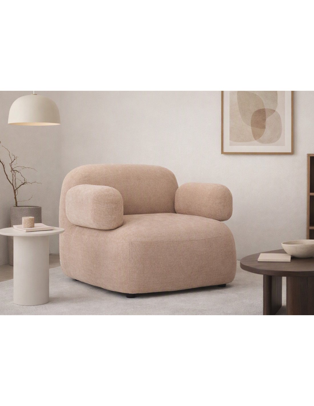 Fauteuil de lecture installé dans un coin détente Fauteuil de lecture installé dans un coin détente
