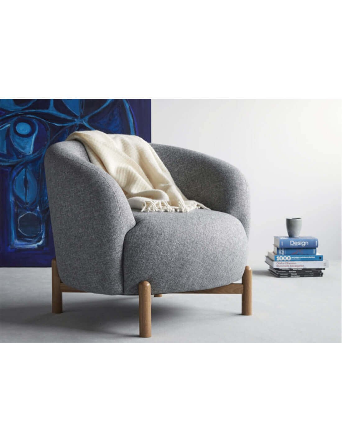 Fauteuil en tissu aux lignes contemporaines Fauteuil en tissu aux lignes contemporaines